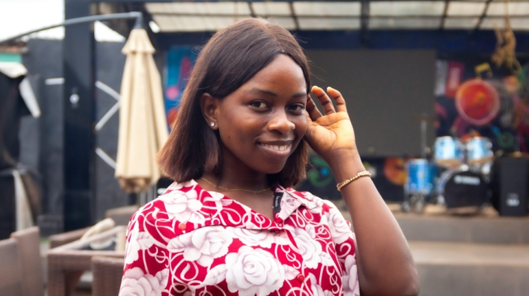 Hearing impaired young lady using sign language